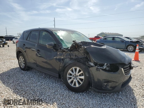 2016 Mazda CX-5 Touring with VIN JM3KE4CY5G0667179, listed as a Copart auction lot 49414625 with 90,155 mi miles and Salvage Title. Bid and sale history available at carsss.com. Image 4.