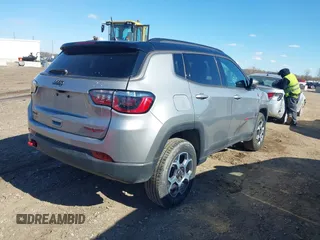 2022 Jeep Compass Trailhawk z VIN 3C4NJDDB8NT192316, wystawiony jako IAAI lot #42044851 z przebiegiem 12 656 mil mil oraz . Historia ofert i sprzedaży dostępna na DreamBid. Obrazek 4.