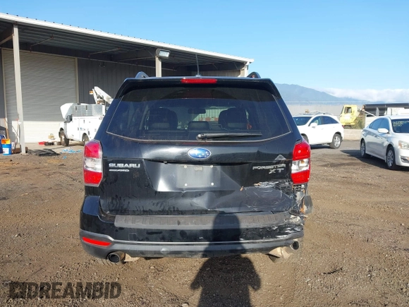 2015 Subaru Forester 2.0XT Touring with VIN JF2SJGUC0FH516972, listed as a IAAI auction lot 41483033 with 103,970 mi miles. Bid and sale history available at carsss.com. Image 16.