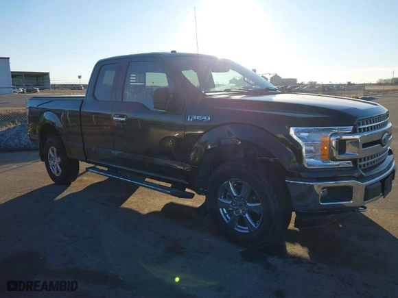 2018 Ford F-150 XL with VIN 1FTFX1E57JKC53726, listed as a IAAI auction lot 41486433 with 119,949 mi miles. Bid and sale history available at carsss.com. Image 6.