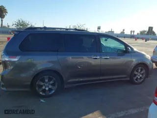 2015 Toyota Sienna SE with VIN 5TDXK3DC9FS551094, listed as a IAAI auction lot 41676903 with 94,345 mi miles. Bid and sale history available at carsss.com. Image 13.