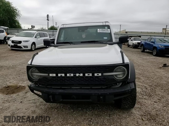 2024 Ford Bronco Wildtrak with VIN 1FMEE2BP9RLA07694, listed as a Copart auction lot 51856335 with 21,102 mi miles and Salvage title. Bid and sale history available at DreamBid. Image 11.
