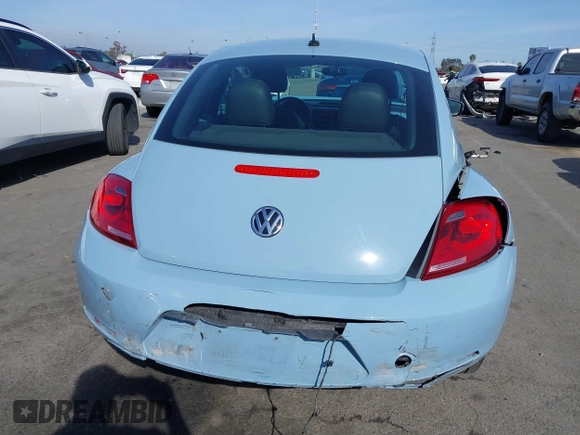 2013 Volkswagen Beetle with VIN 3VWHX7AT4DM667136, listed as a IAAI auction lot 41855778 with 120,300 mi miles and . Bid and sale history available at DreamBid. Image 17.