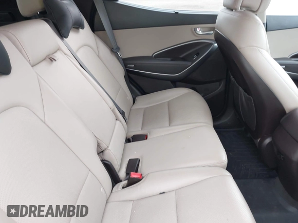 2018 Hyundai Santa Fe 2.4L z VIN 5XYZUDLB1JG543837, wystawiony jako IAAI lot #42235471 z przebiegiem 157 909 mil mil oraz . Historia ofert i sprzedaży dostępna na DreamBid. Obrazek 8.