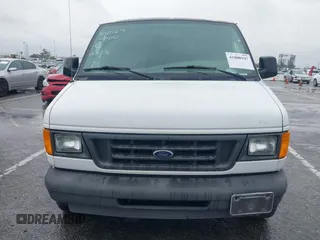 2004 Ford Econoline Cargo with VIN 1FTRE14W94HA16282, listed as a IAAI auction lot 41808947 with Not Provided miles. Bid and sale history available at carsss.com. Image 12.