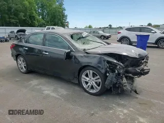 2016 Nissan Altima SL z VIN 1N4BL3AP0GC159564, wystawiony jako Copart lot #56174085 z przebiegiem 107 807 mil mil oraz Szkoda całkowita • Salvage title. Historia ofert i sprzedaży dostępna na DreamBid. Obrazek 14.