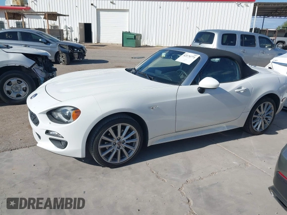2018 FIAT 124 Spider Classica z VIN JC1NFAEKXJ0138258, wystawiony jako IAAI lot #42174771 z przebiegiem 42 867 mil mil oraz . Historia ofert i sprzedaży dostępna na DreamBid. Obrazek 14.