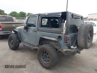 2015 Jeep Wrangler Sport with VIN 1C4GJWAG7FL585631, listed as a IAAI auction lot 41943582 with 88,649 mi miles and . Bid and sale history available at DreamBid. Image 3.
