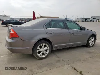 2012 Ford Fusion SE z VIN 3FAHP0HAXCR436084, wystawiony jako Copart lot #57390385 z przebiegiem 88 645 mil mil oraz Szkoda całkowita • Salvage title. Historia ofert i sprzedaży dostępna na DreamBid. Obrazek 3.