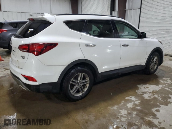 2017 Hyundai Santa Fe 2.4L with VIN 5NMZUDLB2HH005387, listed as a Copart auction lot 64592535 with 82,742 mi miles and Salvage title. Bid and sale history available at DreamBid. Image 3.
