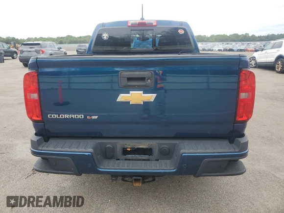 2019 Chevrolet Colorado 4WD Z71 with VIN 1GCGTDEN1K1361851, listed as a Copart auction lot 60630195 with 81,039 mi miles and Salvage title. Bid and sale history available at DreamBid. Image 6.