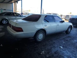 1990 Lexus LS z VIN JT8UF11E2L0030605, wystawiony jako Copart lot #80799614 z przebiegiem 150 085 mil mil oraz Tytuł czysty. Historia ofert i sprzedaży dostępna na DreamBid. Obrazek 3.