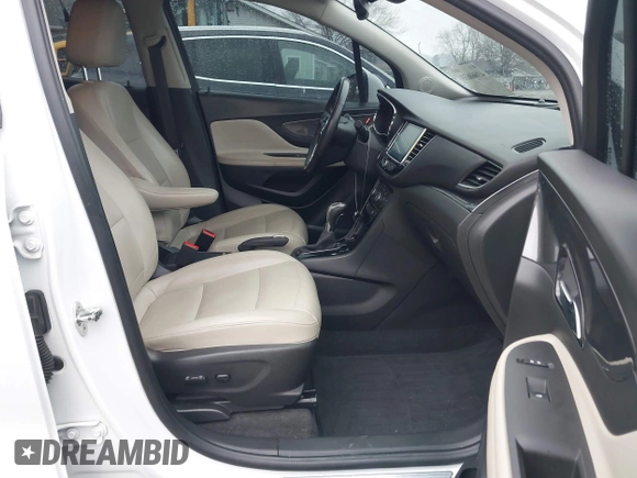 2017 Buick Encore Essence with VIN KL4CJGSB1HB102435, listed as a IAAI auction lot 41660633 with 88,249 mi miles and . Bid and sale history available at DreamBid. Image 5.