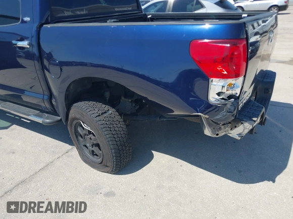 2011 Toyota Tundra z VIN 5TFEY5F17BX103583, wystawiony jako IAAI lot #42017676 z przebiegiem 158 466 mil mil oraz . Historia ofert i sprzedaży dostępna na DreamBid. Obrazek 6.