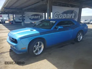2009 Dodge Challenger R/T z VIN 2B3LJ54T29H635811, wystawiony jako Copart lot #57065925 z przebiegiem 207 261 mil mil oraz Czysty tytuł • Clean title. Historia ofert i sprzedaży dostępna na DreamBid. Obrazek 1.