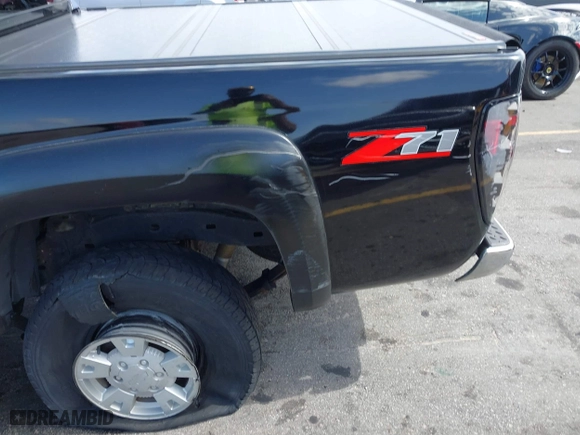 2006 Chevrolet Colorado LT w/3LT with VIN 1GCDS136968142830, listed as a IAAI auction lot 41711509 with 88,587 mi miles. Bid and sale history available at carsss.com. Image 17.