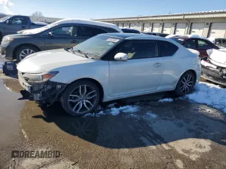 2016 Scion tC with VIN JTKJF5C72GJ022393, listed as a Copart auction lot 88352085 with 115,202 mi miles and Salvage Title. Bid and sale history available at carsss.com. Image 1.