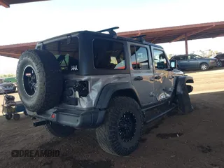 2019 Jeep Wrangler Unlimited Sport S z VIN 1C4HJXDG7KW557682, wystawiony jako IAAI lot #42586742 z przebiegiem 49 741 mil mil oraz . Historia ofert i sprzedaży dostępna na DreamBid. Obrazek 6.