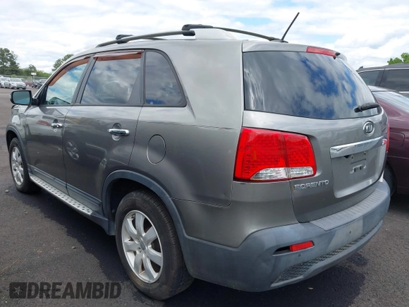 2012 Kia Sorento LX with VIN 5XYKT3A60CG285902, listed as a IAAI auction lot 42142043 with 225,206 mi miles and . Bid and sale history available at carsss.com. Image 3.