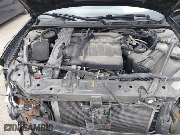 2014 Chevrolet Impala LS with VIN 2G1WA5E39E1136977, listed as a IAAI auction lot 41843947 with 122,709 mi miles and . Bid and sale history available at DreamBid. Image 10.