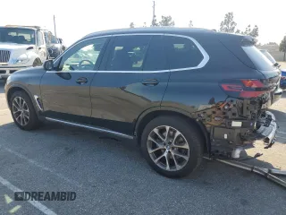 2025 BMW X5 sDrive40i with VIN 5UX13EU05S9W82678, listed as a Copart auction lot 49857255 with 9,901 mi miles and Salvage Title. Bid and sale history available at carsss.com. Image 2.
