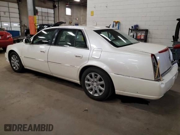 2008 Cadillac DTS 1SA z VIN 1G6KD57Y08U136593, wystawiony jako Copart lot #49208925 z przebiegiem 145 099 mil mil oraz Szkoda całkowita • Salvage title. Historia ofert i sprzedaży dostępna na DreamBid. Obrazek 2.