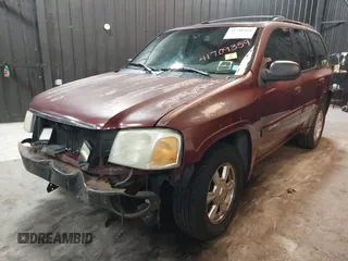 2002 GMC Envoy SLT with VIN 1GKDT13SX22426320, listed as a IAAI auction lot 41709359 with 104,418 mi miles. Bid and sale history available at carsss.com. Image 18.