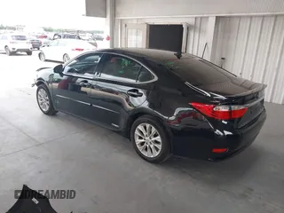 2014 Lexus ES 300h with VIN JTHBW1GG9E2043696, listed as a IAAI auction lot 42392424 with 74,370 mi miles and . Bid and sale history available at DreamBid. Image 3.
