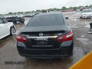 2018 Nissan Altima 2.5 SR with VIN 1N4AL3AP1JC131386, listed as a IAAI auction lot 41895828 with 58,912 mi miles. Bid and sale history available at carsss.com. Image 17.
