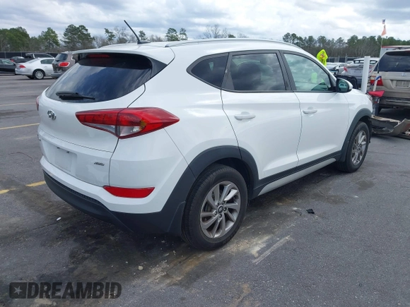 2017 Hyundai Tucson SE with VIN KM8J3CA44HU511581, listed as a IAAI auction lot 41687971 with 111,981 mi miles. Bid and sale history available at carsss.com. Image 4.