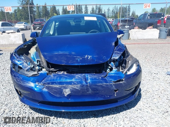 2023 Tesla Model 3 z VIN 5YJ3E1EA9PF639141, wystawiony jako IAAI lot #42167773 z przebiegiem 57 459 mil mil oraz . Historia ofert i sprzedaży dostępna na DreamBid. Obrazek 6.