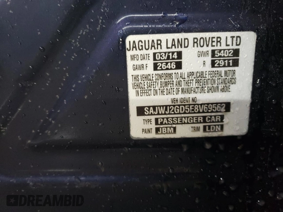 2014 Jaguar XJ Portfolio with VIN SAJWJ2GD5E8V69562, listed as a Copart auction lot 87737195 with 100,525 mi miles and Salvage title. Bid and sale history available at DreamBid. Image 13.