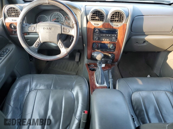 2004 GMC Envoy SLT with VIN 1GKDT13S942407244, listed as a Copart auction lot 70995064 with 162,676 mi miles and Salvage Title. Bid and sale history available at carsss.com. Image 8.