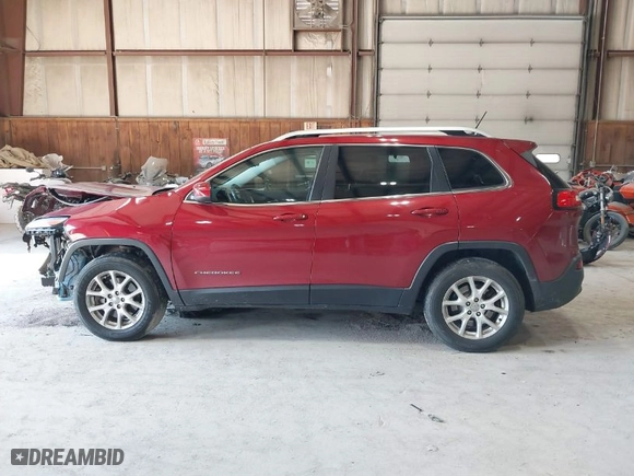 2014 Jeep Cherokee Latitude with VIN 1C4PJMCS9EW310314, listed as a IAAI auction lot 41759493 with 151,335 mi miles. Bid and sale history available at carsss.com. Image 15.