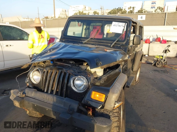 2005 Jeep Wrangler Unlimited with VIN 1J4FA44S35P314941, listed as a IAAI auction lot 41278276 with 248,865 mi miles. Bid and sale history available at carsss.com. Image 6.