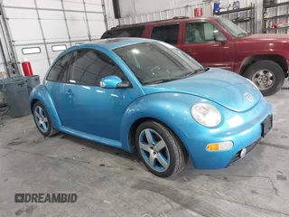 2004 Volkswagen Beetle Satellite Blue z VIN 3VWGK31C94M422268, wystawiony jako IAAI lot #42255431 z przebiegiem 127 672 mil mil oraz . Historia ofert i sprzedaży dostępna na DreamBid. Obrazek 1.