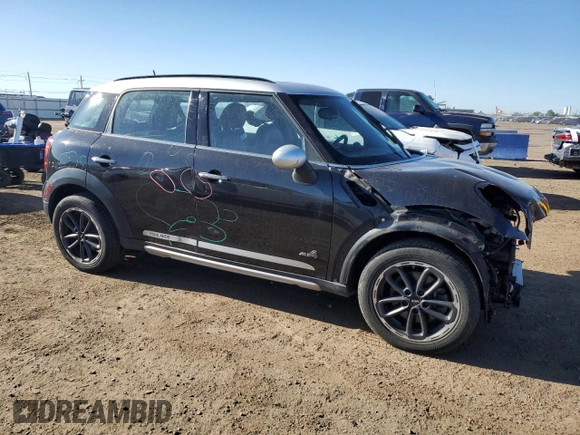 2016 MINI Countryman S with VIN WMWZC5C59GWU21416, listed as a Copart auction lot 57477455 with 119,868 mi miles and Salvage title. Bid and sale history available at DreamBid. Image 4.