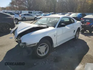 1997 Ford Mustang with VIN 1FALP4041VF194986, listed as a Copart auction lot 78841404 with 118,936 mi miles and Salvage Title. Bid and sale history available at carsss.com. Image 1.