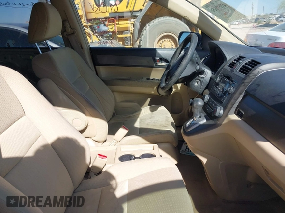 2009 Honda CR-V EX with VIN JHLRE38599C007909, listed as a IAAI auction lot 42077656 with 223,597 mi miles and . Bid and sale history available at carsss.com. Image 5.