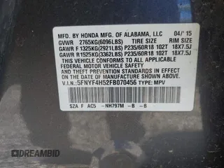 2015 Honda Pilot EX-L with VIN 5FNYF4H52FB070456, listed as a IAAI auction lot 41247639 with 182,998 mi miles and . Bid and sale history available at carsss.com. Image 9.