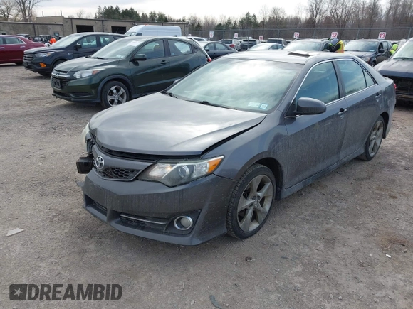 2014 Toyota Camry L with VIN 4T1BF1FK7EU460516, listed as a IAAI auction lot 41908434 with 174,987 mi miles. Bid and sale history available at carsss.com. Image 2.
