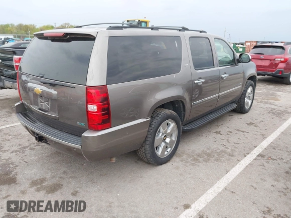 2011 Chevrolet Suburban LTZ with VIN 1GNSKKE32BR197356, listed as a IAAI auction lot 42052377 with 248,574 mi miles and . Bid and sale history available at DreamBid. Image 4.
