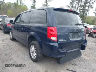 2015 Dodge Grand Caravan SXT with VIN 2C4RDGCG7FR712193, listed as a IAAI auction lot 41942063 with 268,900 mi miles and . Bid and sale history available at DreamBid. Image 3.