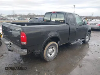 2000 Ford F-150 XL with VIN 1FTRX18W9YNA63551, listed as a IAAI auction lot 41446703 with Not provided miles and . Bid and sale history available at DreamBid. Image 4.