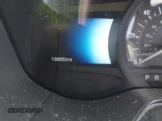 2019 Ford Fusion Hybrid SE with VIN 3FA6P0LU6KR243678, listed as a IAAI auction lot 40004890 with 138,533 mi miles. Bid and sale history available at carsss.com. Image 7.