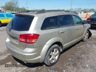 2009 Dodge Journey SXT with VIN 3D4GG57V69T232517, listed as a IAAI auction lot 42039587 with 346,783 mi miles. Bid and sale history available at carsss.com. Image 4.