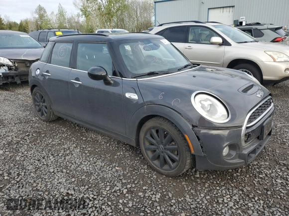2016 MINI Hardtop 4 Door S with VIN WMWXU3C50G2B66741, listed as a Copart auction lot 52871335 with 53,653 mi miles and Salvage title. Bid and sale history available at DreamBid. Image 4.