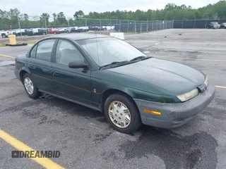 1998 Saturn SL z VIN 1G8ZH5280WZ295857, wystawiony jako IAAI lot #42238789 z przebiegiem 153 163 mil mil oraz . Historia ofert i sprzedaży dostępna na DreamBid. Obrazek 1.