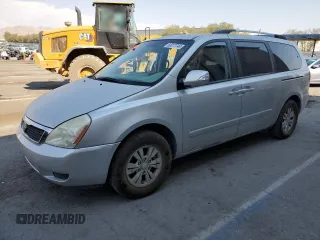 2012 Kia Sedona LX with VIN KNDMG4C71C6492455, listed as a Copart auction lot 63077744 with 210,306 mi miles and Salvage Title. Bid and sale history available at carsss.com. Image 1.