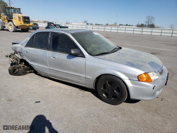 1999 Mazda Protege ES with VIN JM1BJ2214X0152087, listed as a Copart auction lot 47630634 with 289,766 mi miles and Salvage Title. Bid and sale history available at carsss.com. Image 4.